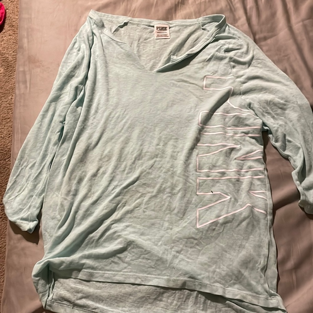 Teal slightly see through shirt